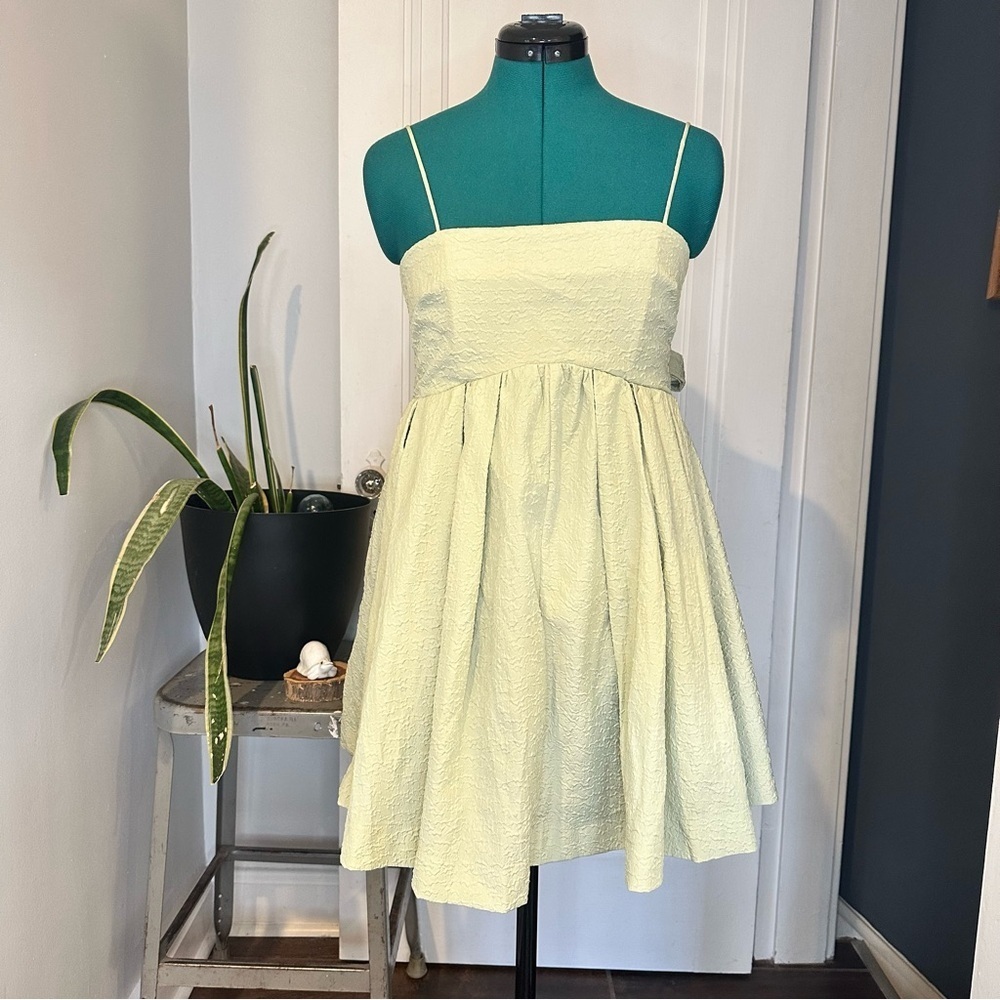 Mable light green babydoll mini dress with tie front or back